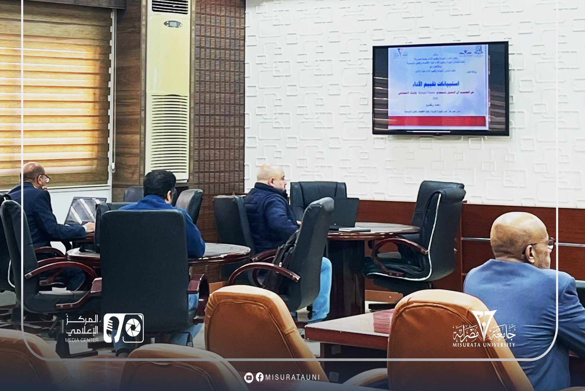 A specialized workshop at Misrata University on employing artificial intelligence in analyzing evaluation data.
                     width=
