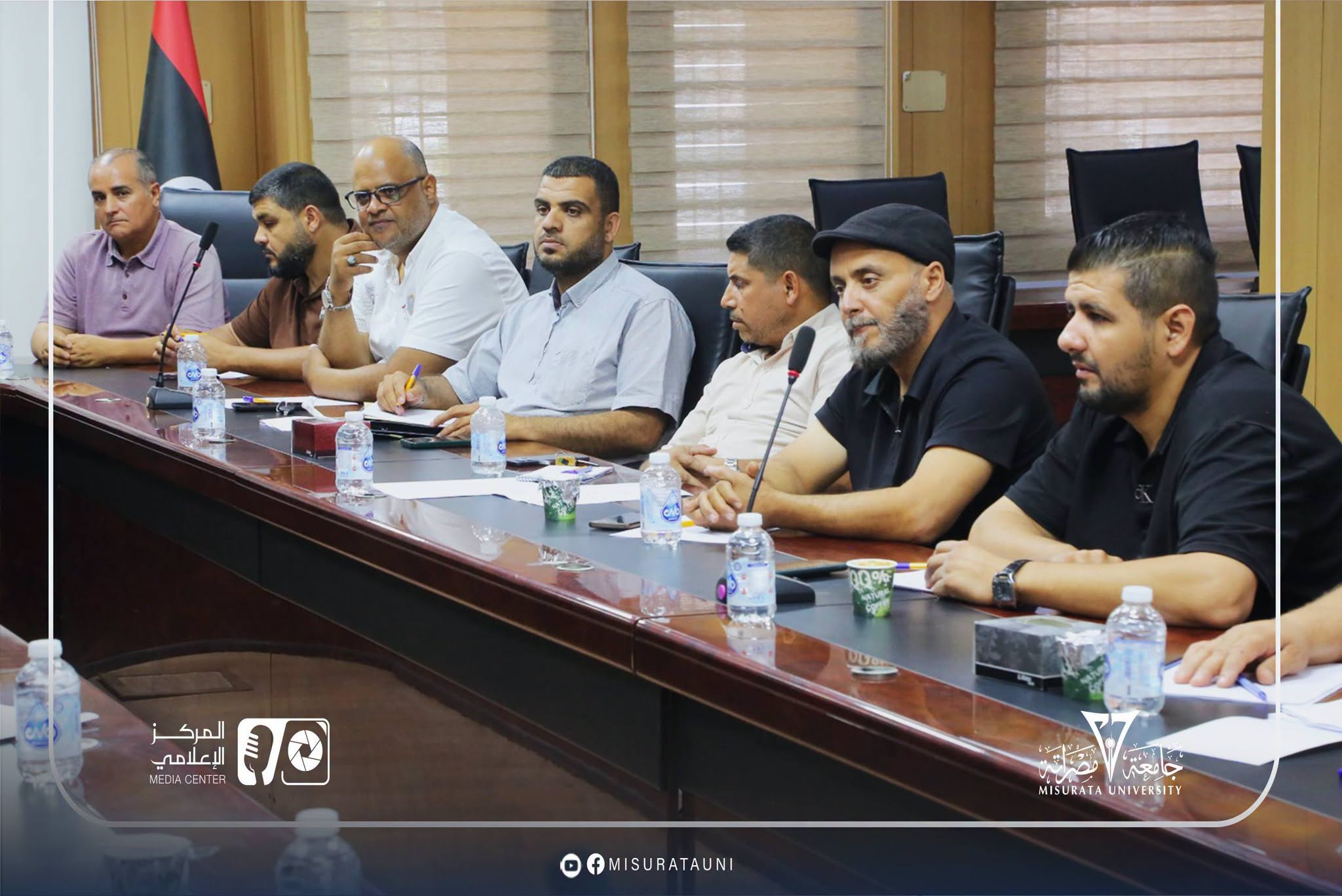 A meeting of administrative affairs directors at Misrata University to discuss workflow and standardize procedures.
width=